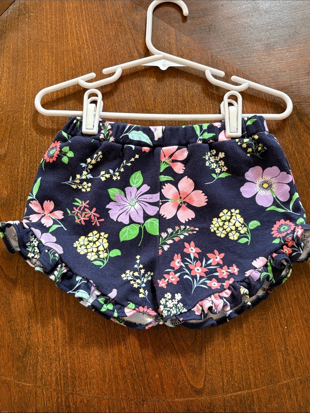 The Beaufort Bonnet Company Navy Floral Ruffle Bloom Shorts
